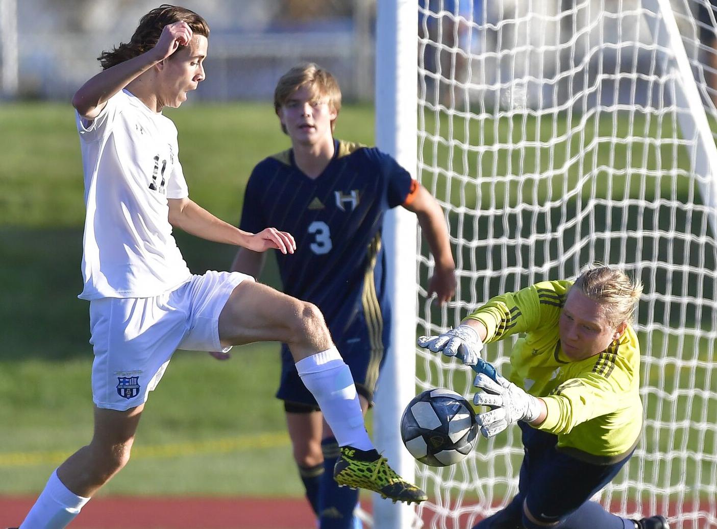 St. Dominc vs Holt in soccer playoff game